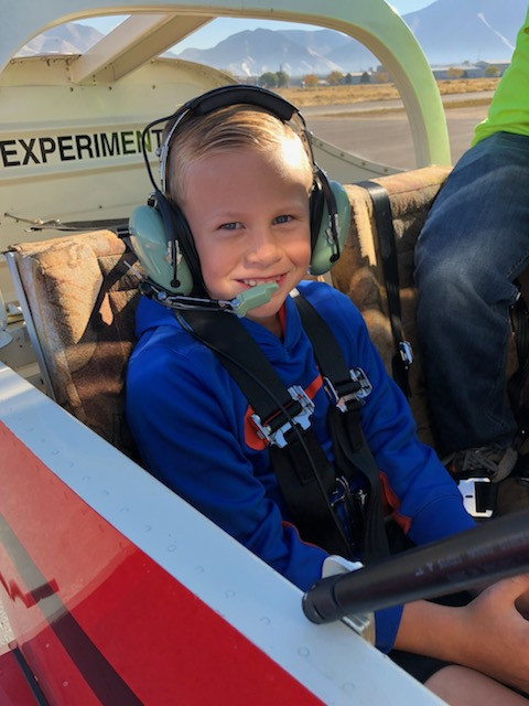 A boy prepares for takeoff